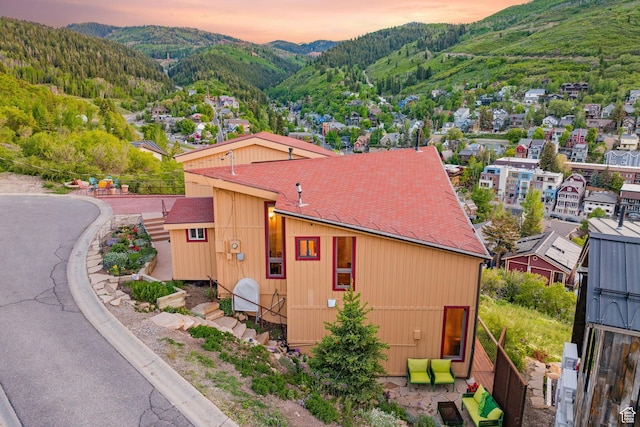 235 Mchenry Ave, Park City, UT 84060 - property exterior at dusk featuring a mountain view and a shingled roof