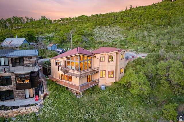 235 Mchenry Ave, Park City, UT 84060 - back of property featuring a balcony and a view of trees