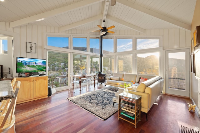 235 Mchenry Ave, Park City, UT 84060 - living room with wood finished floors, ceiling fan, and a wood stove