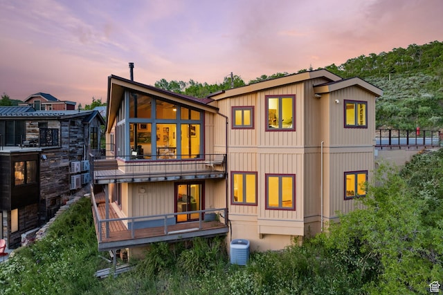235 Mchenry Ave, Park City, UT 84060 - back of property at dusk featuring a balcony