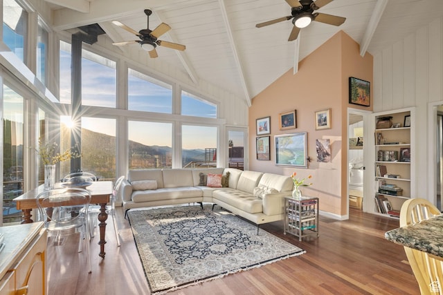 235 Mchenry Ave, Park City, UT 84060 - living area with ceiling fan, high vaulted ceiling, beamed ceiling, and wood finished floors