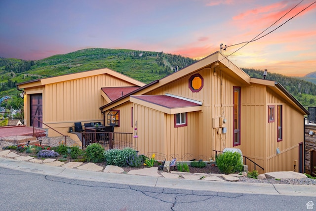 235 Mchenry Ave, Park City, UT 84060 - view of front of house with a mountain view and board and batten siding
