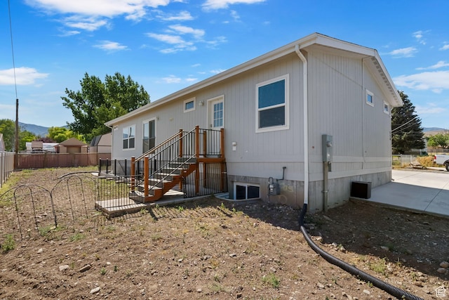 516 N Broadway Ave, Tooele, UT 84074 - rear view of property featuring a patio area