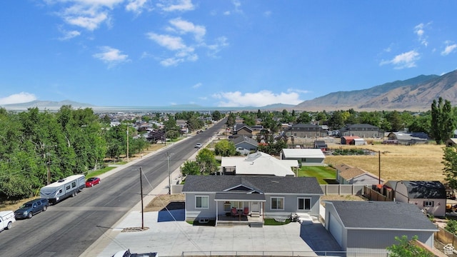 516 N Broadway Ave, Tooele, UT 84074 - aerial view of property and surrounding area featuring a mountainous background
