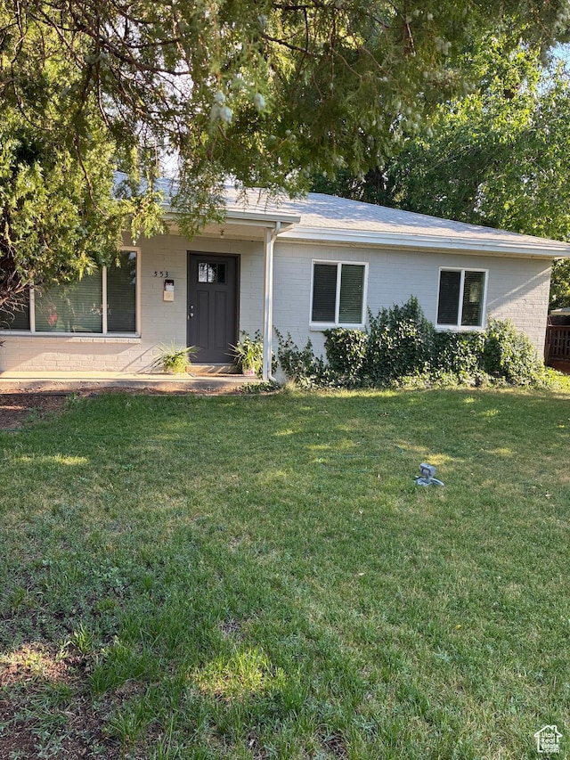 553 Clark St, Woods Cross, UT 84010 - single story home with a front yard