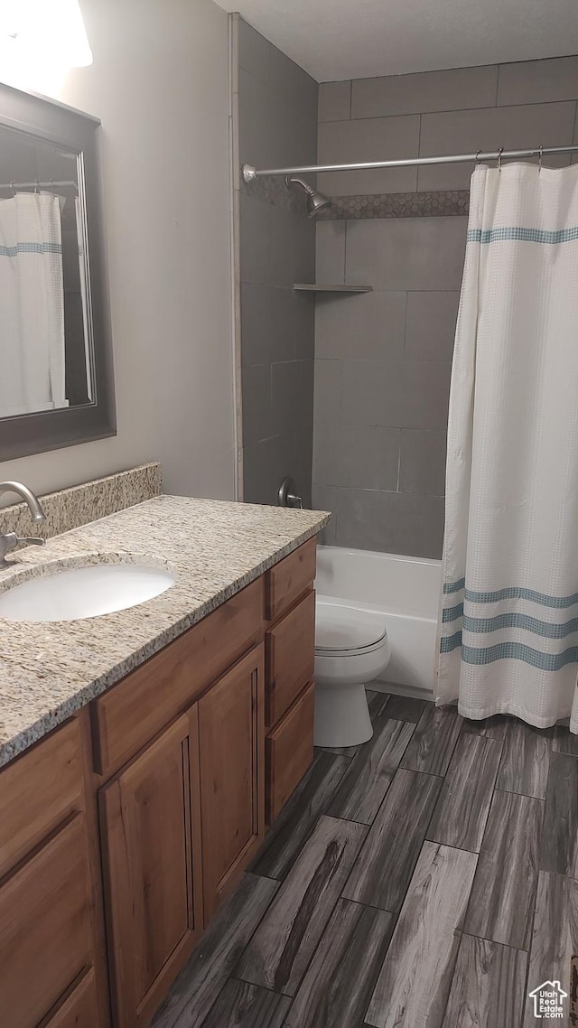 553 Clark St, Woods Cross, UT 84010 - full bathroom with vanity, shower / bath combo, and wood finish floors