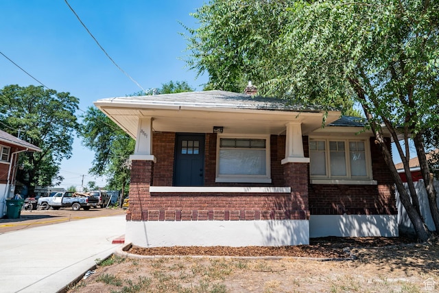 3561 S Grant Ave E, Ogden, UT 84401 - view of front of house featuring brick siding and a porch