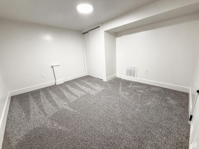 3561 S Grant Ave E, Ogden, UT 84401 - finished basement featuring dark carpet and baseboards