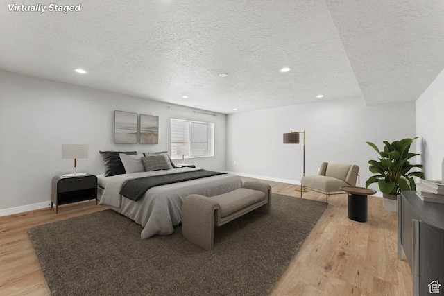 3301 W Cramden Dr, Lehi, UT 84043 - bedroom with a textured ceiling, light wood finished floors, and recessed lighting