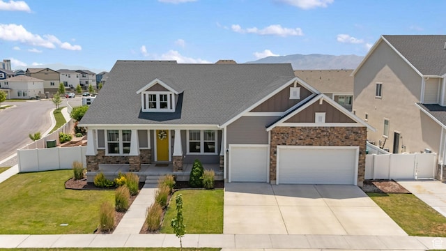 3301 W Cramden Dr, Lehi, UT 84043 - craftsman-style house with a residential view, board and batten siding, concrete driveway, stone siding, and covered porch