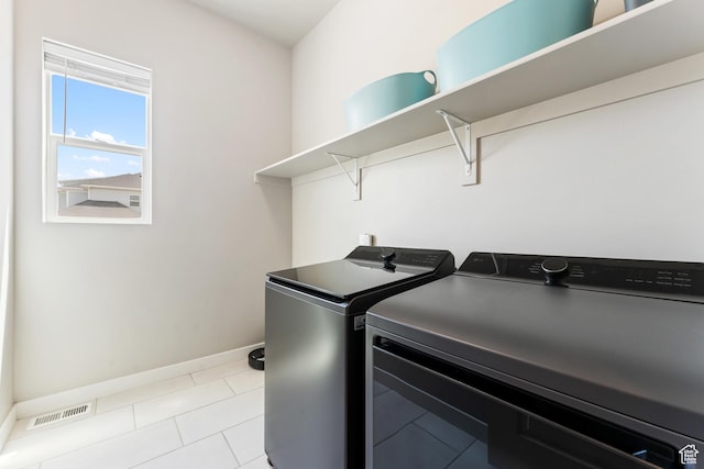 3301 W Cramden Dr, Lehi, UT 84043 - laundry area with separate washer and dryer and light tile patterned floors