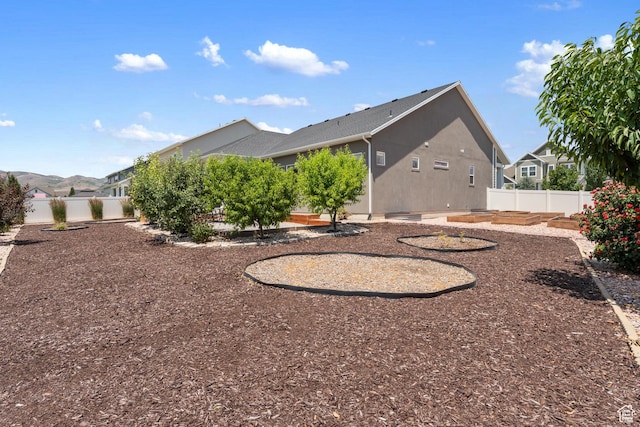 3301 W Cramden Dr, Lehi, UT 84043 - back of property with a fenced backyard and a patio