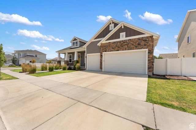 3301 W Cramden Dr, Lehi, UT 84043 - craftsman house with board and batten siding, driveway, and an attached garage