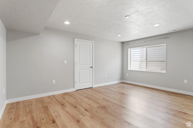 3301 W Cramden Dr, Lehi, UT 84043 - spare room with a textured ceiling, light wood finished floors, and recessed lighting