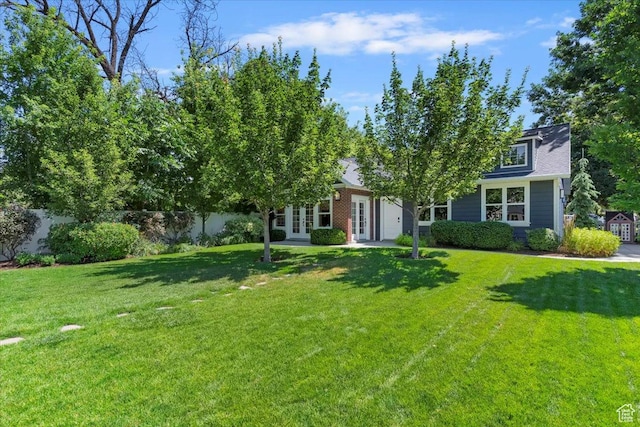 93 S 200 E, Kaysville, UT 84037 - view of property hidden behind natural elements featuring french doors and an attached garage