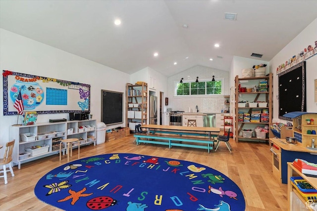 93 S 200 E, Kaysville, UT 84037 - playroom with vaulted ceiling and wood finished floors