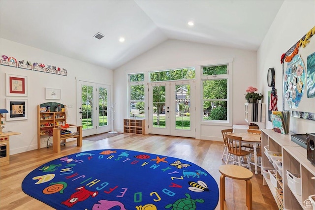 93 S 200 E, Kaysville, UT 84037 - playroom featuring french doors, wood finished floors, and high vaulted ceiling
