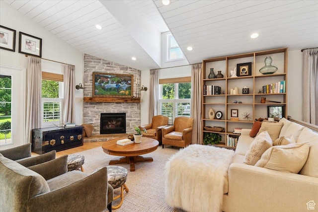 93 S 200 E, Kaysville, UT 84037 - living room with a fireplace, a skylight, recessed lighting, and wood ceiling