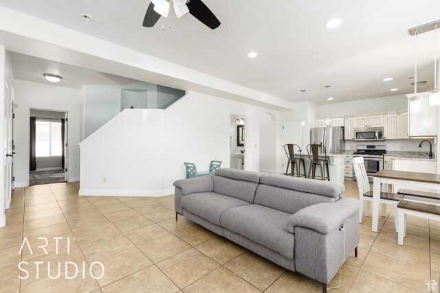 94 S 6175 W, Hurricane, UT 84737 - living room featuring ceiling fan, light tile patterned flooring, and recessed lighting