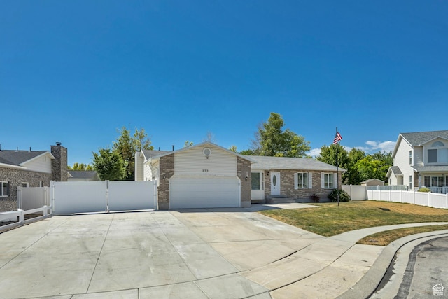 2331 W 13190 S, Riverton, UT 84065 - ranch-style home with an attached garage, brick siding, and concrete driveway