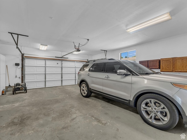 3112 W 5685 S, Taylorsville, UT 84129 - garage featuring a garage door opener