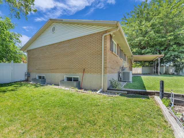 3112 W 5685 S, Taylorsville, UT 84129 - view of side of property featuring brick siding and a fenced backyard