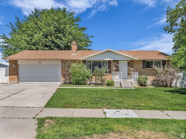 3112 W 5685 S, Taylorsville, UT 84129 - single story home featuring driveway, a garage, brick siding, a front yard, and a chimney