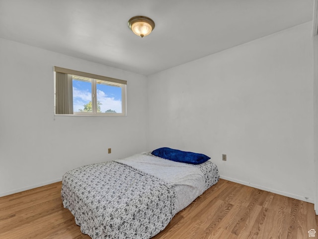 3112 W 5685 S, Taylorsville, UT 84129 - bedroom with light wood-style flooring