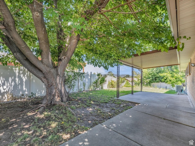 3112 W 5685 S, Taylorsville, UT 84129 - fenced backyard with a patio area