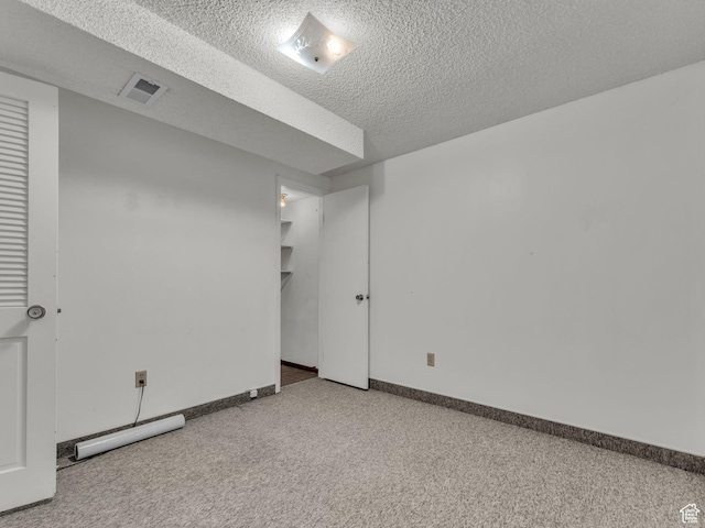 3112 W 5685 S, Taylorsville, UT 84129 - carpeted empty room featuring a textured ceiling and baseboards