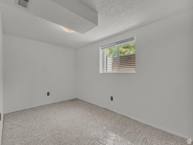 3112 W 5685 S, Taylorsville, UT 84129 - carpeted spare room featuring a textured ceiling and baseboards