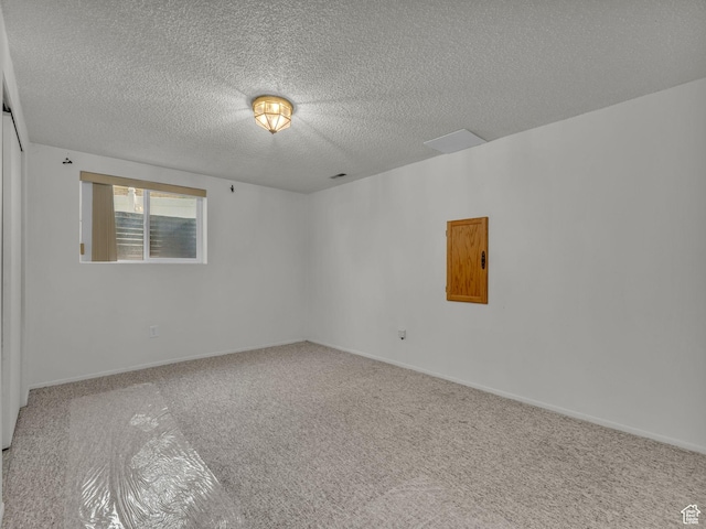 3112 W 5685 S, Taylorsville, UT 84129 - empty room with carpet floors and a textured ceiling