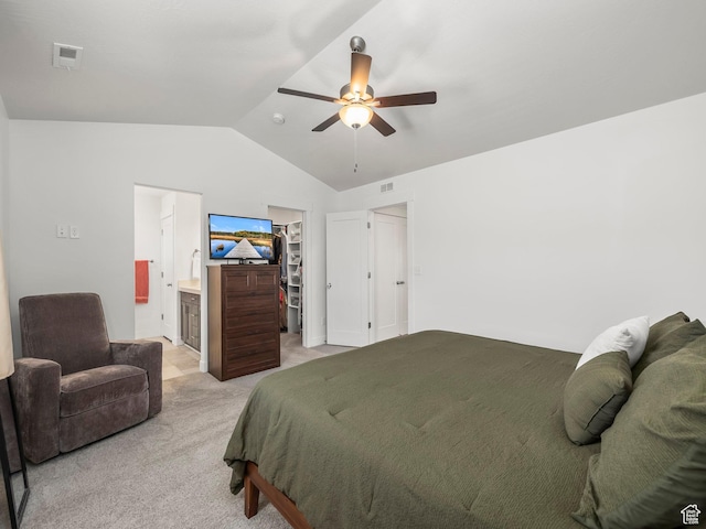5084 E Lakefield Dr E, Eagle Mountain, UT 84005 - bedroom with vaulted ceiling, a spacious closet, light colored carpet, ceiling fan, and connected bathroom