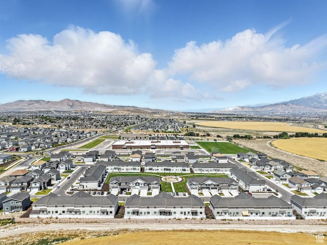5084 E Lakefield Dr E, Eagle Mountain, UT 84005 - aerial perspective of suburban area with a mountainous background