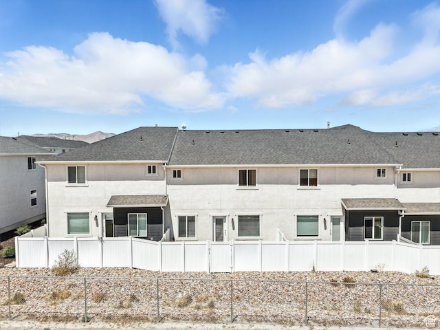 5084 E Lakefield Dr E, Eagle Mountain, UT 84005 - back of property featuring stucco siding