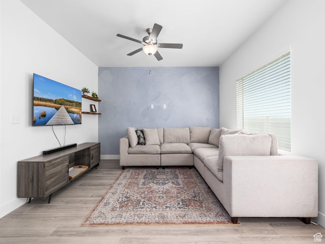 5084 E Lakefield Dr E, Eagle Mountain, UT 84005 - living area featuring a ceiling fan and light wood-type flooring