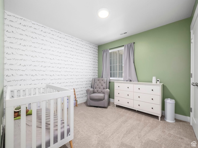 5084 E Lakefield Dr E, Eagle Mountain, UT 84005 - carpeted bedroom with a crib and an accent wall