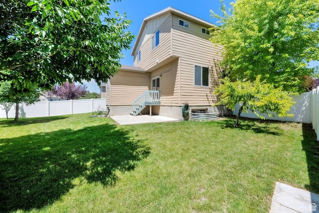 1879 W 2250 N, Lehi, UT 84043 - back of house featuring a fenced backyard and a patio