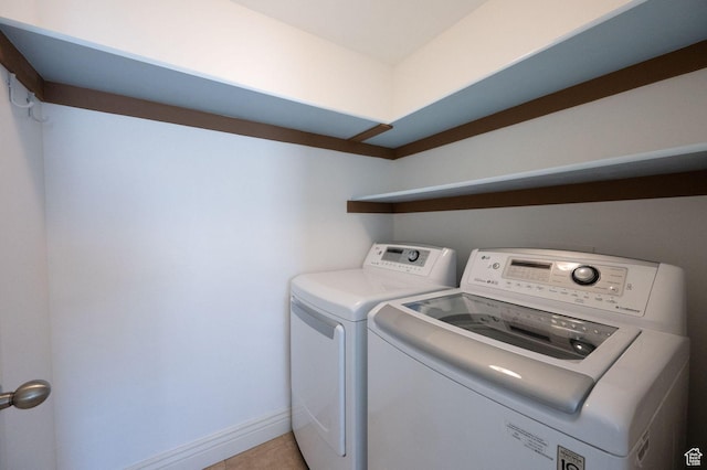 1879 W 2250 N, Lehi, UT 84043 - laundry room with washing machine and dryer and light tile patterned flooring