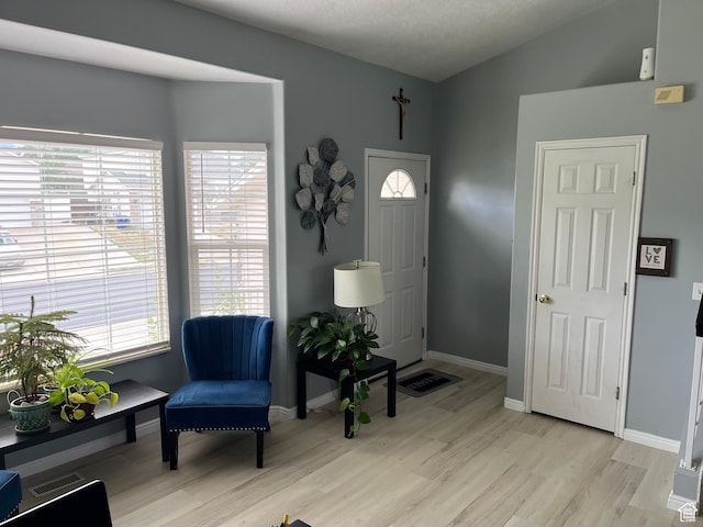 6433 S Laurel Canyon Dr W, Salt Lake City, UT 84118 - foyer entrance featuring light wood-style flooring and baseboards