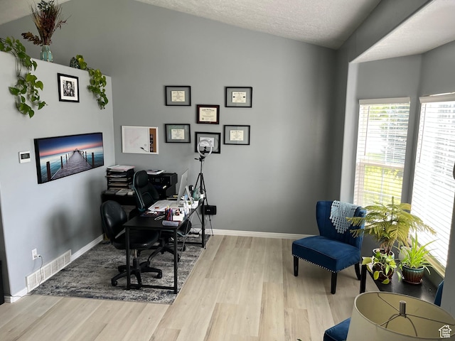 6433 S Laurel Canyon Dr W, Salt Lake City, UT 84118 - home office featuring wood finished floors and a textured ceiling