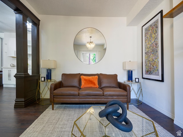 374 E 6th Ave, Salt Lake City, UT 84103 - living area featuring decorative columns and wood finished floors