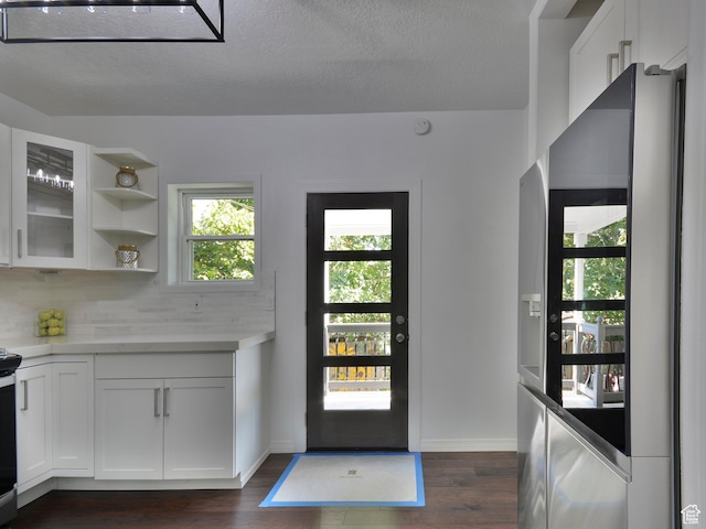 374 E 6th Ave, Salt Lake City, UT 84103 - entrance foyer featuring dark wood-style floors and a textured ceiling