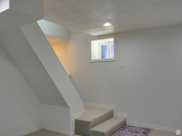 374 E 6th Ave, Salt Lake City, UT 84103 - stairway featuring a textured ceiling, recessed lighting, and carpet