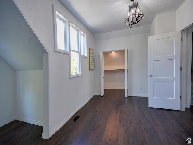 374 E 6th Ave, Salt Lake City, UT 84103 - hallway featuring a chandelier and dark wood-type flooring