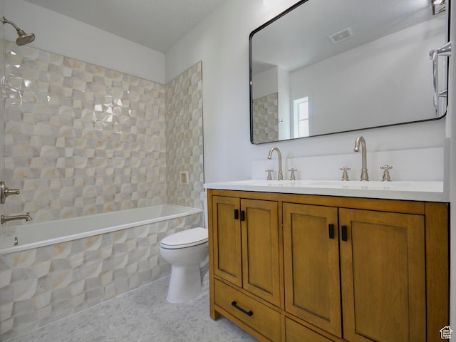 374 E 6th Ave, Salt Lake City, UT 84103 - bathroom featuring double vanity and tiled shower / bath