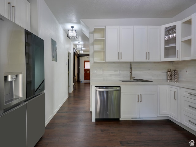 374 E 6th Ave, Salt Lake City, UT 84103 - kitchen with stainless steel dishwasher, open shelves, backsplash, and white cabinets