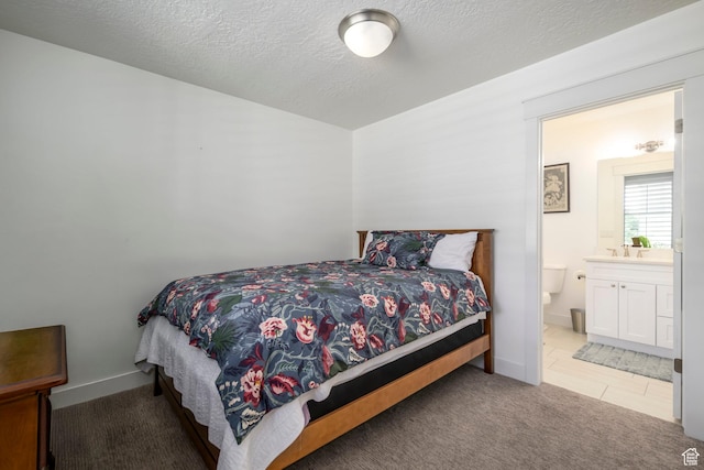 10465 S Beetdigger Blvd, Sandy, UT 84070 - carpeted bedroom featuring ensuite bath and a textured ceiling