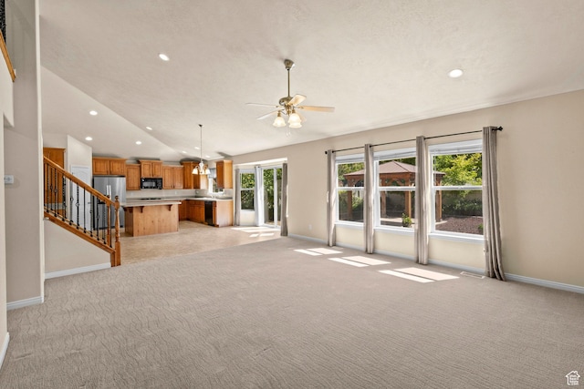 1221 S 130th St E, Payson, UT 84651 - unfurnished living room featuring a ceiling fan, lofted ceiling, light colored carpet, recessed lighting, and stairs