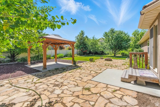 1221 S 130th St E, Payson, UT 84651 - fenced backyard with a gazebo, a fire pit, and a patio area
